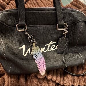 Coach Black Leather Satchel with Iridescent Feather Charm